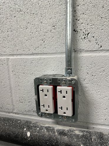 Commercial 20 amp T-slot receptacles.