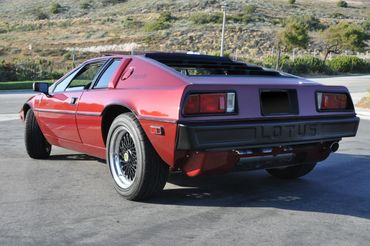 A modified red Lotus car