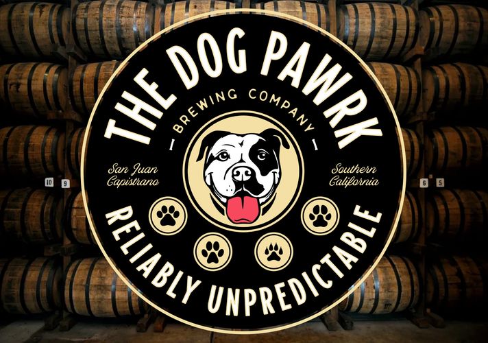 The Dog Pawrk Logo on a background of wood barrels