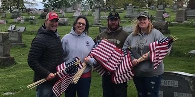 Community service by WCVWOT with the Norwin VFW placing flags at Union Cemetery in May 2020.