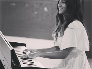 Student performing the piano downtown Brampton