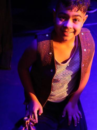 Aladdin production student with Synergy Music Academy