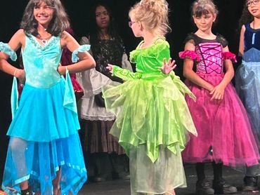 Young Theatre Class students performing with Synergy Music Academy