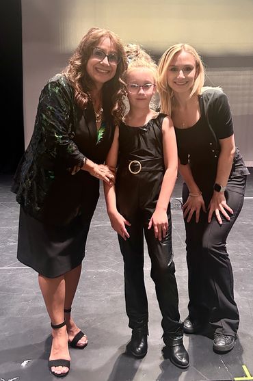 Our drama student with their teacher and Synergy Music Academy's director