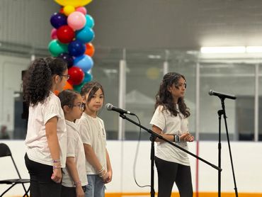 Synergy Music Academy drama students performing at KiteFest in Brampton