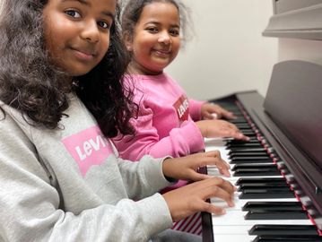 Group piano lessons at Synergy Music Academy