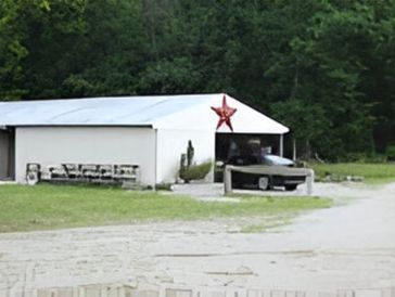 White barn with star.