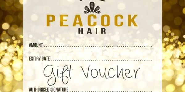 A gift voucher example.  white card with black writing on a sparkly background.