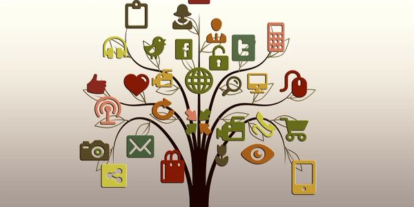 Illustration of a tree with different digital logos on it