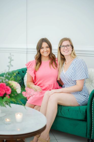 Baby Shower Guests sitting on green couch.