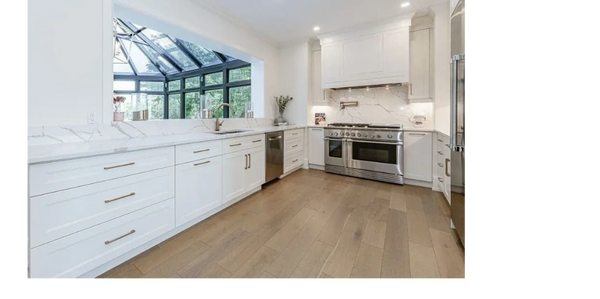 Kitchen featuring quartz countertops fabricated & installed by Stone Innovation in Guelph, Ontario.
