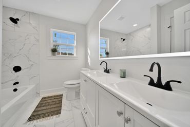 Charming little fixer upper on Galveston Island. This is the only bathroom so we had to make it POP!