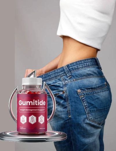 A person showing loose jeans, promoting Gumitide weight management supplement.