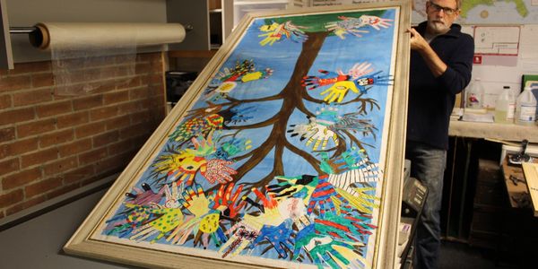 Fondren art gallery's colorful abstract tree painting of hands as leaves