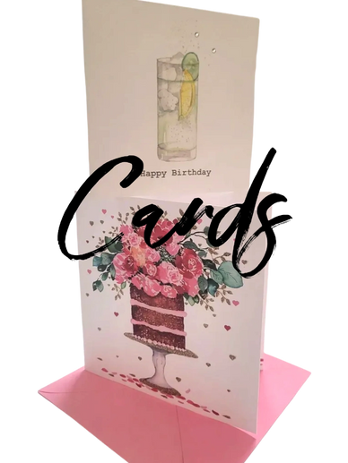 Two birthday cards stacked on top of one another sitting on a pink envelope.
