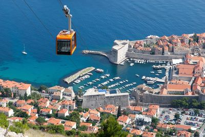 Gondola and view of the city of dubrovnik and the adriatic sea
