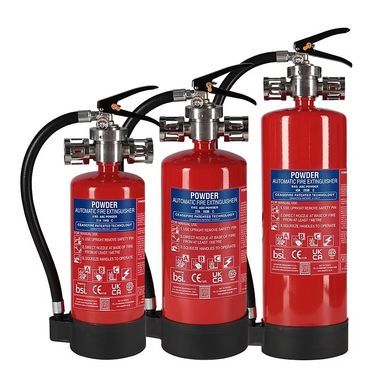 Three red powder automatic fire extinguishers of varying sizes.