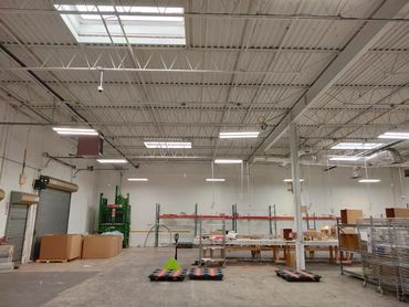 Warehouse lighting scissor lift