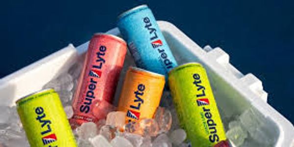 Colorful Super Lyte energy drink cans chilling in ice.