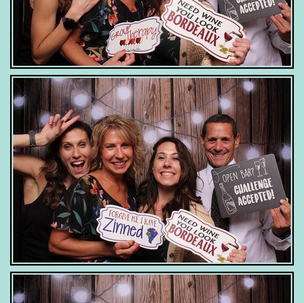 Guests posing at a wedding in our Hudson Valley photo booth rental.