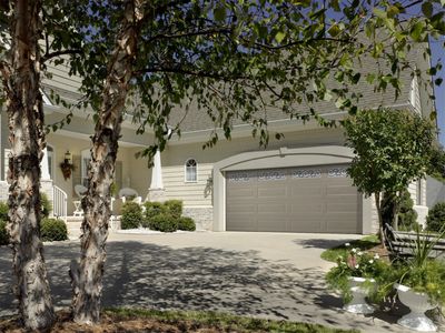 Amarr Brand insulated garage door with decraglass windows.