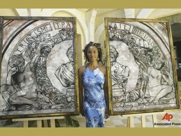 Keariene Muizz with diptych oil painting Adieu
Photo Credit: Eric Risberg (Associated Press)