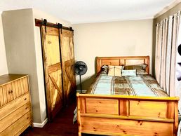 Front bedroom with custom closet and study desk