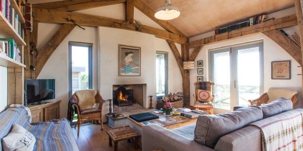 St Breca holiday cottage living room - Aspects Holidays designed by Roderick James Architects