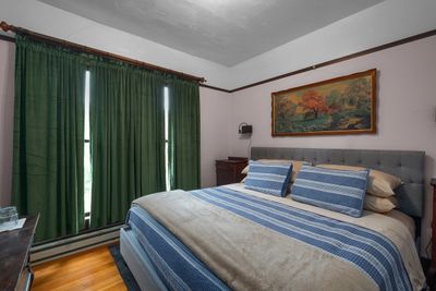 Licorice Fern king bed guest room. Pet friendly!