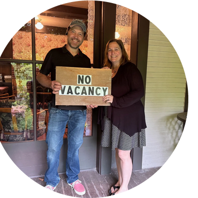 Owners of Old Growth Fir Properties; Lorena and Matthew Maurer; on porch of McCleary Hotel