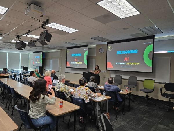 Classroom lecture on designing AI business strategy.