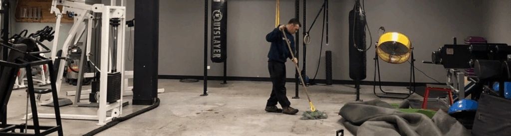 cleaner mopping cement gym floors 