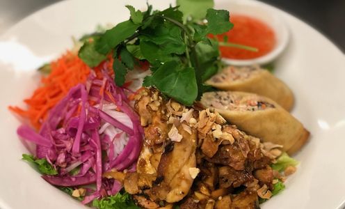 chopped salad with herbs egg roll and bbq chicken