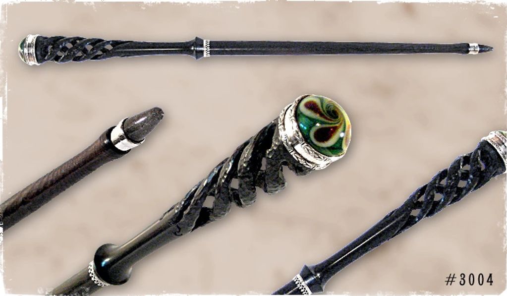 Magic wand features: Wood: Spiral Carved Blackwood / Accents: Lampwork cabochon, sterling silver