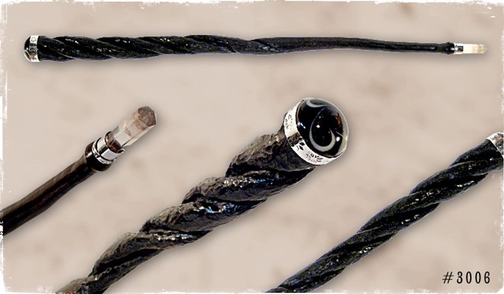 Magic wand features: Wood: Blackwood Carved Twist / Accents: Amethyst, Silver, lamp work cabochon