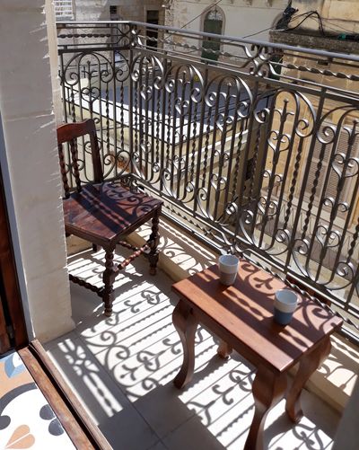 Romantic sunny balcony overlooking Oratory Street at The 3Cities Auberge