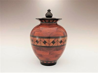 Segmented hand turned wooden adult cremation urn for ashes. SU17ABLWE