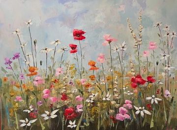 Colorful wildflowers in a serene field.