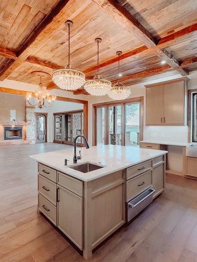 Lake views from every room, tall ceilings, & exquisite design focused around living on the lake