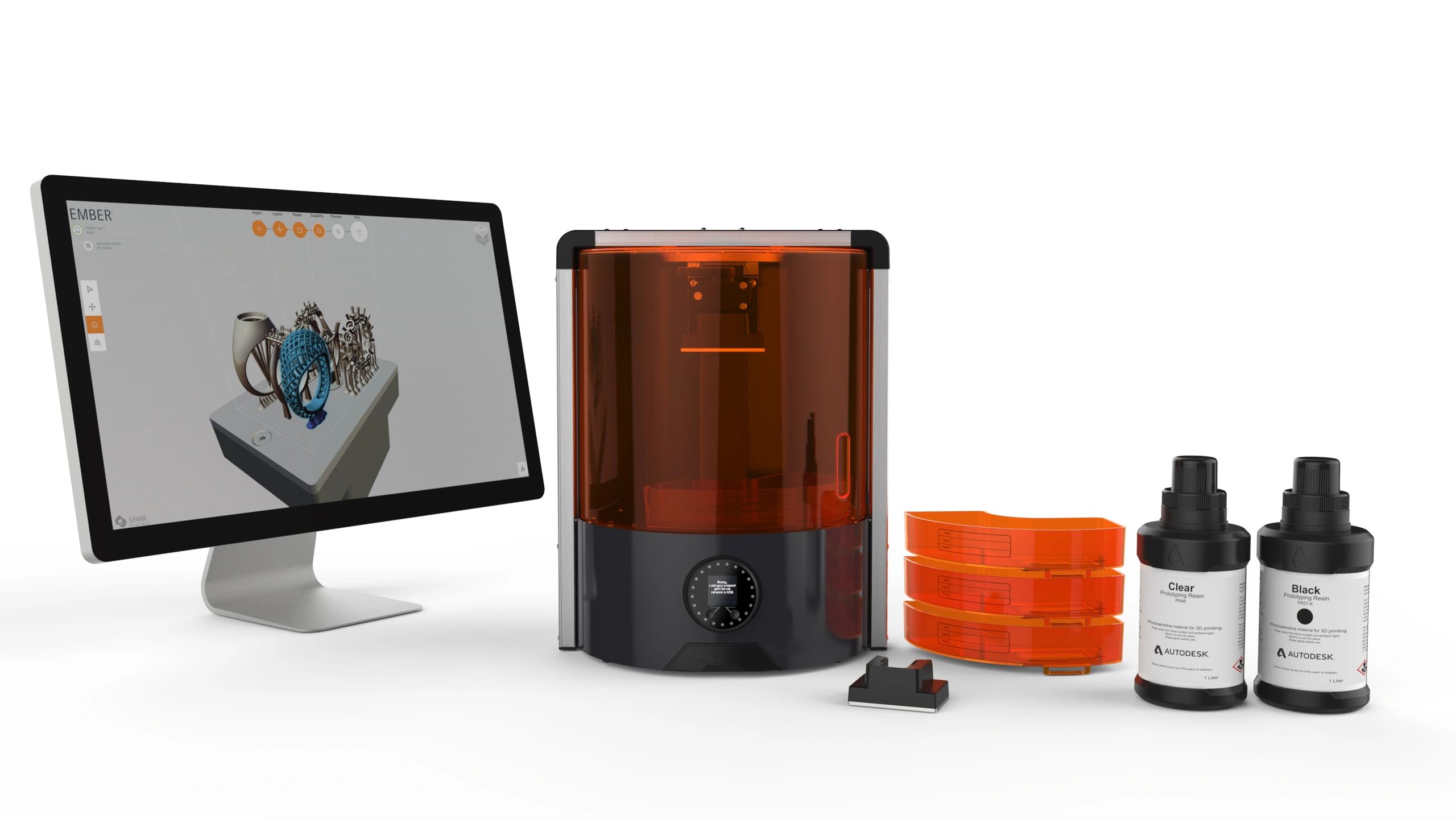 autodesk 3D printer with bottles and a computer screen