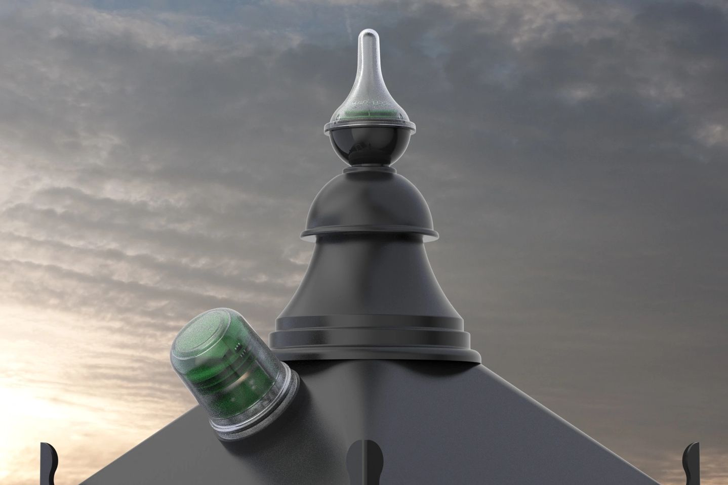 street lamp with a sensor on the top with a sunset in the background