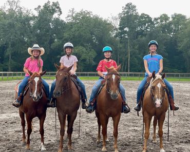 Mariah, Eva, Avery and Lauren having a group lesson here at Old Wire Stables 