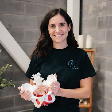 Pelvic Physio in Markham holding a pelvic model