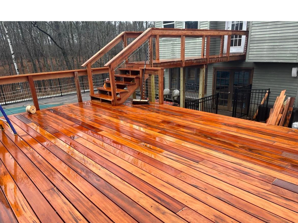 Customer requested custom Tiger Wood deck build.  Flooring complete.  Rails in process.