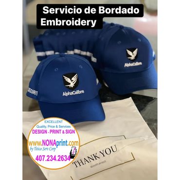 an image promoting servicio de bordado embroidery and a hat
