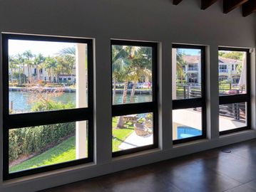 Cape Coral home with newly installed hurricane impact windows, designed for storm safety.