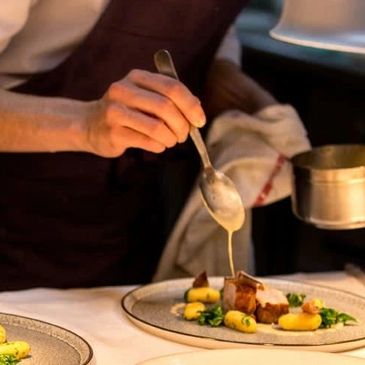 a chef preparing a dish