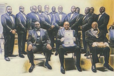 A group of men in tuxedos posing formally, one holding a certificate.