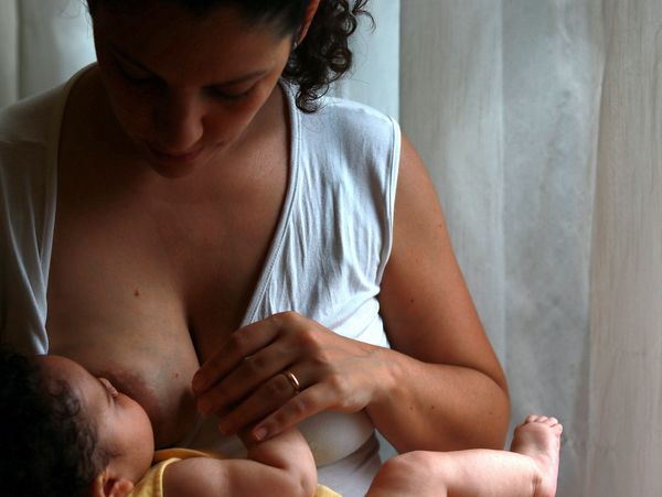 Woman breastfeeding Photo by Luiza Braun on Unsplash