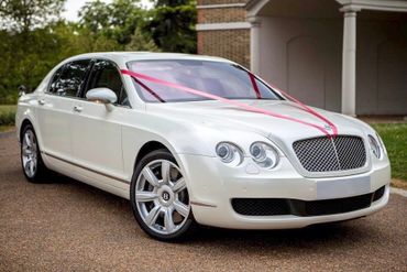 Bentley wedding car with ribbons
